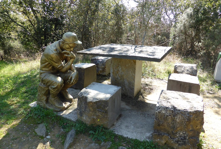 A metal statue at the Chianti Sculpture Museum