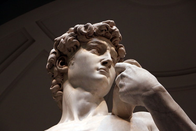 A close up to the original David at the Accademia Museum in Florence