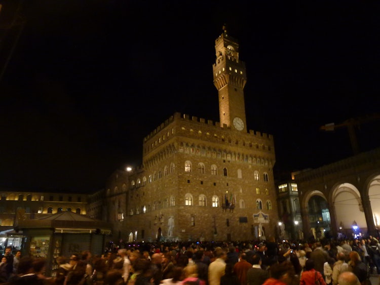 The Tower lite at night in Piazza Signoria