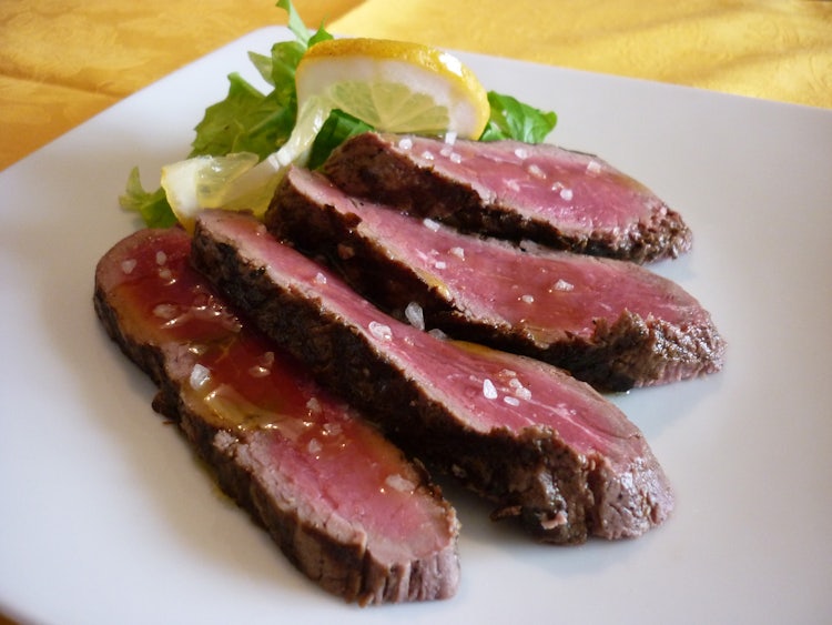 Extra virgin olive oil and the tagliata beef steak