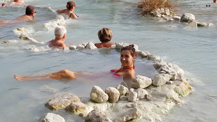 Finding a quiet spot in Saturnia hot springs in Maremma Tuscany