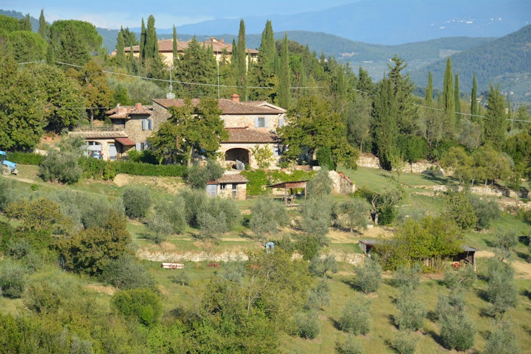 Typical Tuscany farmhouse surrounded by a relax and quite landscape at Agricola Poderino vacation apartments