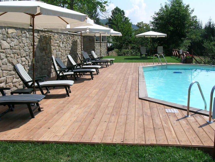 Poolside view for Borgo Isora in Pistoia Tuscany
