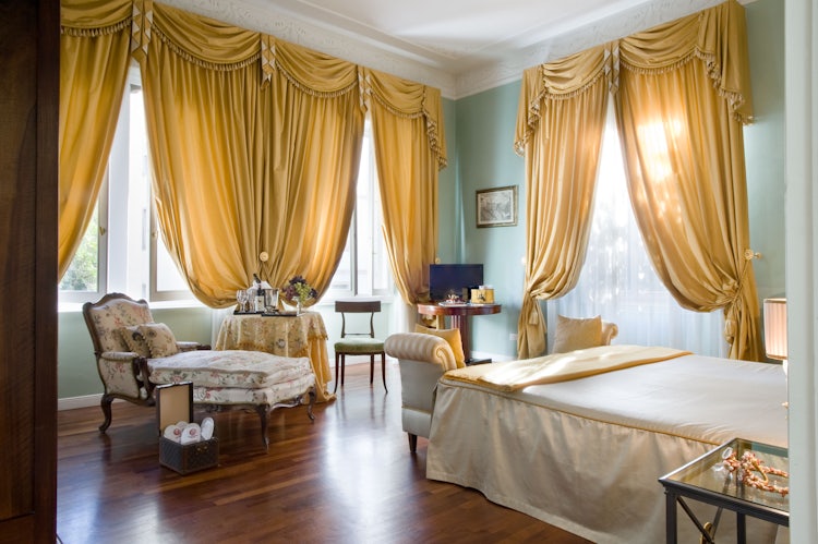 Luxury bedroom in in an authentic Tuscany villa rental