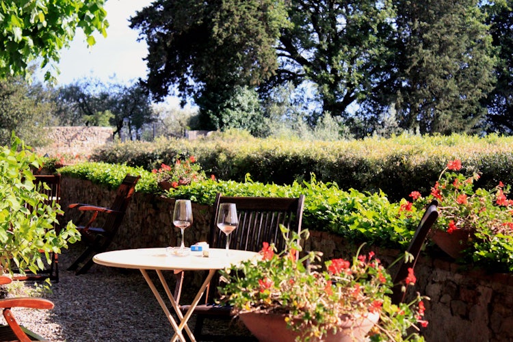 Wine glasses in garden at Il Villa il Poggiale
