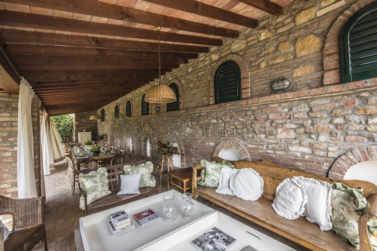 Relax in the shadey loggia at the holiday vacation rental Villa Piaggia near Montaione