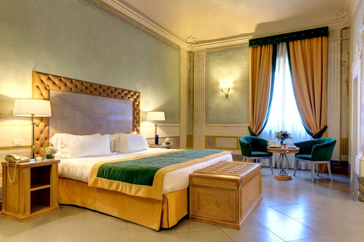 Deluxe bedroom at Villa Tolomei